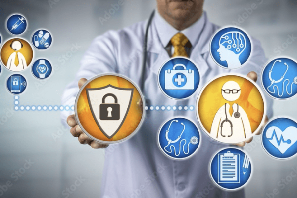 A doctor is holding out a shield with medical icons. A doctor is holding out a shield with medical icons.